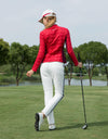 Women's padded pants with navy stripe trims, in white.