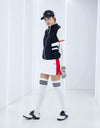 Women's A-line skirt, in white, with red and navy trims.
