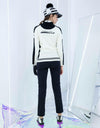 Women's zip-up sweater, in black and white color blocking.