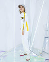Boy's long sleeve top with mock neck, in yellow and white color blocking, and black trims.