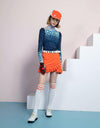 Women's long sleeve layer tee with zipped stand collar, in multi-color geo print.