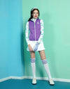 Women's double-sided vest with stand collar, in purple or all-over floral print.