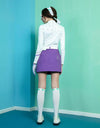Women's A-line skirtcwith dropped back hem, in purple.