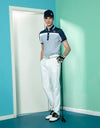 Men's short sleeve polo, in gray, navy and white color blocking.