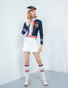 Women's long sleeve polo, in white and navy color blocking, with phoenix print, red and blue stripe trims.