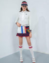 Women's long sleeve polo, in white, with folded chiffon decoration, red and navy stripe trims.
