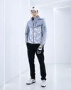 Men's zip-up jacket with padding, in gray, white and black color blocking.