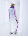 Women's stretchy slim pants with purple accents, in white.