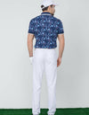 Men's short sleeve polo, in navy, with all-over floral print.
