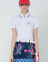 Women's short sleeve polo, in white, floral embroidery on chest and sleeves.