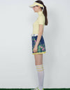 Women's Navy A-Line skirt, yellow pleated lining, floral print.