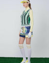 Women's A-Line skirt, with pleated hem. white, yellow and navy color blocking, in floral print.