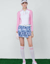 Women's skort,  in blue, cycling print, with pink stripes on the side.