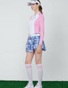 Women's skort,  in blue, cycling print, with pink stripes on the side.