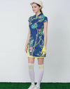 Women's navy mid-length cheongsam, with yellow pleated lining, in floral print.