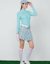 Women's green long sleeve layering top, mock neck, floral print. 