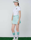 Women's A-Line skirt with side pleat, in green.