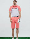 Men's short sleeve polo, with black trim, orange and white color blocking.