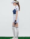 Women's short sleeve polo with cat shape print, in navy and white color blocking.