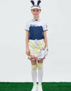 Girl's short sleeve polo with cat shape print, in navy and white color blocking.