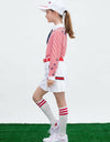 Girl's long sleeve polo with removable necktie, in red stripe and unbrella print.