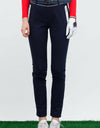 Women's navy slim pants, with water-proof zipped pockets.