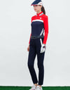 Women's long sleeve polo, in red and navy color blocking.