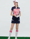 Women's short sleeve polo, in navy and white color blocking, with red stripes.