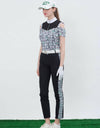 Women's off-shoulder polo with stand zipped collar, green, white and black color blocking, letter printing.Women's off-shoulder polo, with stand zipped collar, in green, white and black color blocking, and letter print.