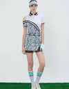 Women's A-Line skirt, with mesh lining, green color insert, and letter print.