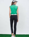 Women's sleeveless top, in green, with balck and white trims on shoulder and sleeves.