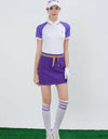 Women's white short sleeve polo, with red and yellow stripe trims, purple contrasting sleeves