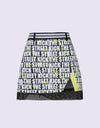Women's A-Line skirt, with mesh lining, yellow color insert, and letter print.