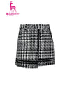 Women's A-line tweed skirt, in black and white houndstooth print.