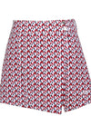 Women's A-line skirt, with red and navy geo print, in white.