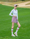 Women's long sleeve polo with geo printed neck, in white.