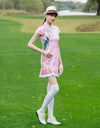 Women's mid-length cheongsam, in white and pink color blocking, with peacock print.