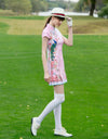 Women's mid-length cheongsam, in white and pink color blocking, with peacock print.