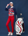 Women's slim pants with zipped pockets, in red.