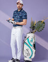 Men's short sleeve polo, in navy, floral print.